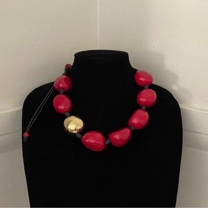 Tagua nut red necklace.